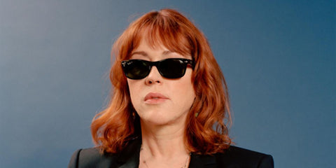 Acttess Molly Ringwald was seen wearing the iconic black Ray-Ban New Wayfarer 2132 901/58 Polarised sunglasses in a Wall Street Journal feature, May 2019.