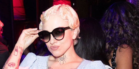 Chilean singer Mon Laferte was seen wearing black Gucci GG1171SK 002 sunglasses with grey gradient lenses at the Latin Grammy Awards 2025 After Party.