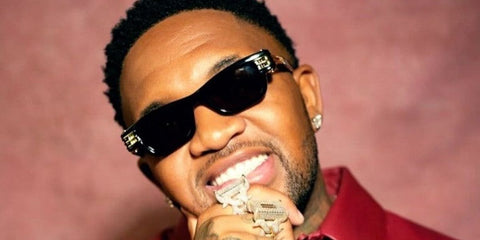 DJ and record producer Mustard was seen wearing black and gold Bottega Veneta BV1308S 001 sunglasses in a social media post.