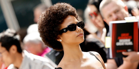 Actress Myha'la Herrold was seen wearing black Prada PR 17WS 1AB5S0 Symbole Sunglasses at the Toronto International Film Festival 2025. Shop online now on Pretavoir