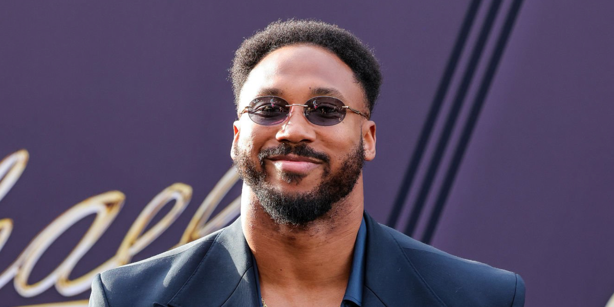 American football player Myles Garrett of Cleveland Browns was seen wearing silver Ray-Ban RB 3767 003/87 oval sunglasses with grey lenses at the Hollywood premiere of "Michael", April 2026