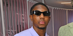 Footballer Myles Lewis-Skelly of the Arsenal F.C. was seen wearing black Loewe Signature LW40196U 01A sunglasses at the Wimbledon Tennis Championships 2026.