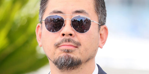 South Jirean film director Na Hong-jin was seen wearing silver Porsche Design 8947 B sunglasses at the "Hope" photocall during Cannes Film Festival 2026.