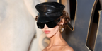 Photographer and filmmaker Nadia Lee Cohen was seen wearing black Saint Laurent Sun SL 832 001 sunglasses at the Saint Laurent Fall/Winter 2026 fashion show during Paris Fashion Week.