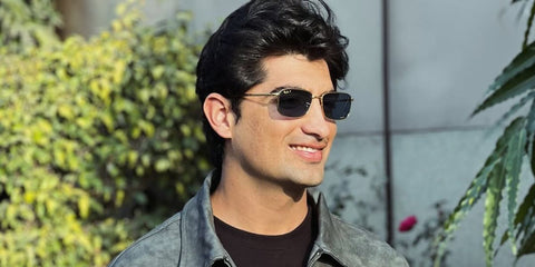 Pakistani cricketer Naseem Shah was seen wearing legend gold Ray-Ban RB 3717 9196/S2 rectangular sunglasses with blue polarised chromance lenses