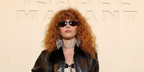 Natasha Lyonne wore black and gold Isabel Marant IM 0288/S RHL/IR sunglasses at the Isabel Marant Spring Summer 2027 show during Paris Fashion Week.