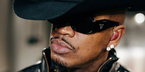 Ne-Yo is seen wearing Prada PR 17WS 1AB5S0 Symbole Sunglasses upon his performance at the Big 12 Conference, December 2024