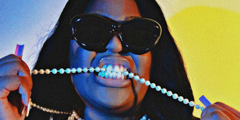 Internet personality Nella Rose was seen wearing black Loewe Inflated LW40097I 01A cat eye sunglasses in a Notion feature, January 2023 digital issue