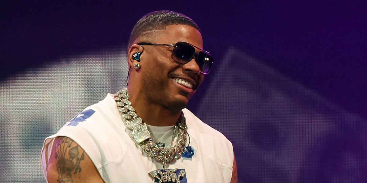 Nelly was seen wearing black iron Dita Mach Six DTS 121 06 sunglasses onstage at the IHeartRadio 106.1 KISS FM's Jingle Ball 2025 in New York City.
