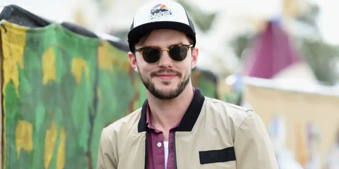 Nicholas Hoult is seen wearing Persol Cellor 3105S 24/33 sunglasses at the Glastonbury festival