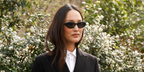 Australian designer Nicole Warne was seen wearing black Prada PR 26ZS 16K08Z cat eye sunglasses at the Hermes Fall/Winter 2026 fashion show during Paris Fashion Week.