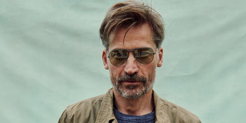 Nikolaj Coster-Waldau was seen wearing black Ray-Ban Aviator Large Metal RB 3025 002/51 sunglasses with brown lenses at the Ray-Ban Studios during All Points East Festival 2021