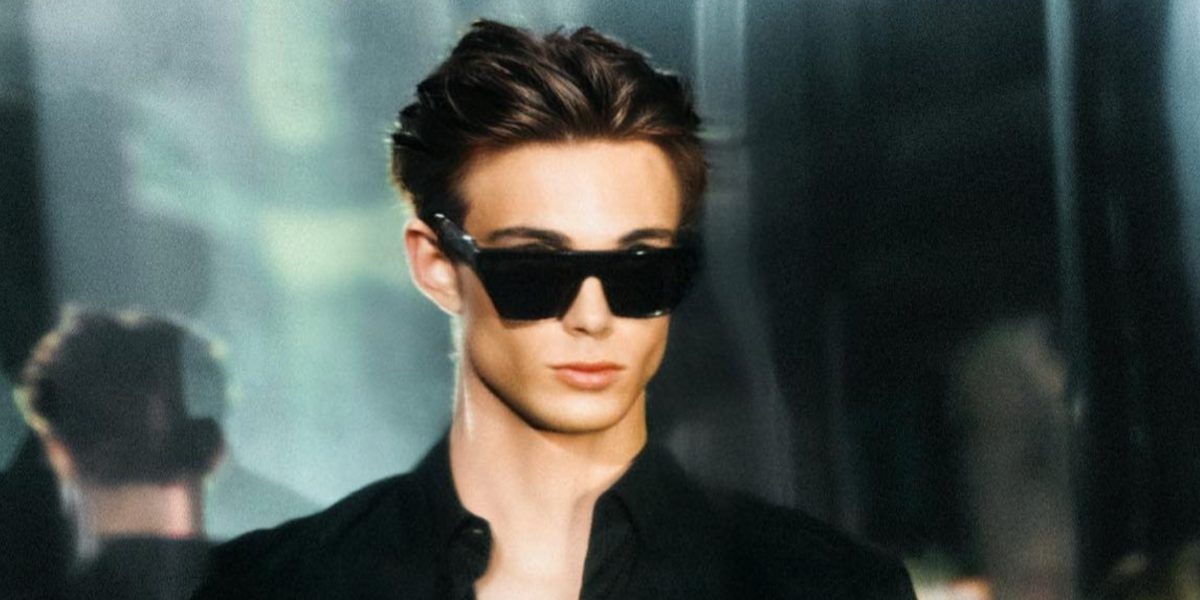 German digital creator Nils Kuesel was seen wearing black Saint Laurent Sun SL 469 001 sunglasses at a YSL Beauty event in Paris, October 2023.