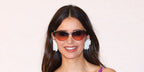 Nina Dobrev was seen wearing gold Chloe CH0386S 004 Uma cat eye sunglasses with brown to orange gradient lenses at the Chloe Fall/Winter 2026 fashion show during Paris Fashion Week.