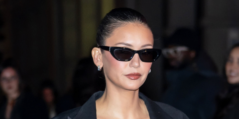 Nina Dobrev was seen wearing black Saint Laurent Sun SL M126 001 sunglasses at YSL Beauty event LOVE 24/7 in New York City, February 2026