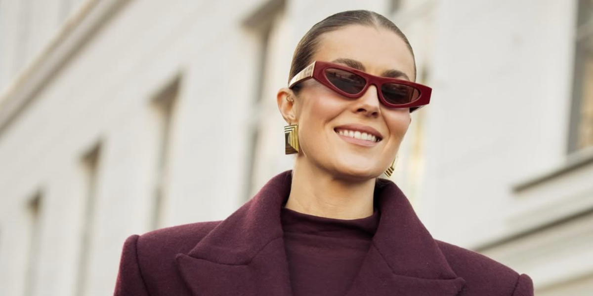 Nina Sandbech was seen wearing red burgundy Gucci GG1779S 003 cat eye sunglasses in her Instagram post