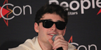 Noah Schnapp was seen wearing the iconic Ray-Ban Wayfarer 2140 901 Black sunglasses during a press conference promoting Stranger Things
