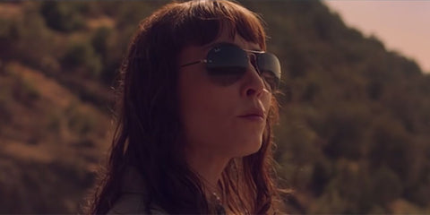 Swedish actress Noomi Rapace was seen wearing gold Ray-Ban RB 3449 001/13 sunglasses with brown gradient lenses in 2019 movie "Close". Shop online now on Pretavoir