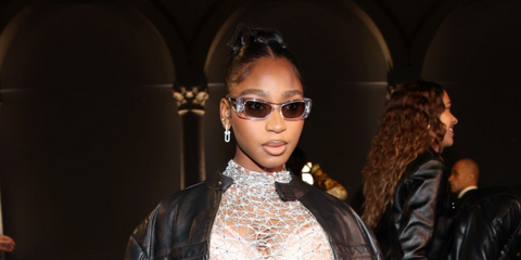 Normani was seen wearing transparent Versace 4481 148/8V sunglasses with grey lenses at the Versace Spring/Summer 2025 fashion show during Milan Fashion Week. Shop online now on Pretavoir