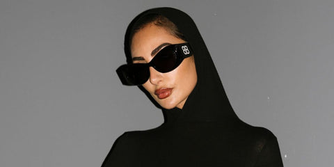 Egyptian-Lebanese actress Nour Al Ghandour was seen wearing black Balenciaga BB0394S 001 sunglasses at the Balenciaga Spring/Summer 2025 fashion show during Paris Fashion Week