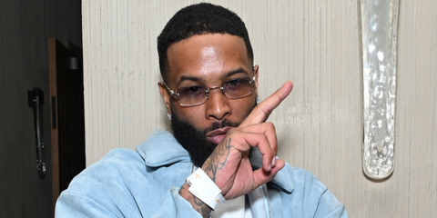 Odell Beckham Jr. was seen wearing pale gold Miu Miu MU B50S ZVN80O rimless sunglasses with blue gradient lenses at the H.wood Homecoming 2026 in San Francisco, ahead of Super Bowl LX