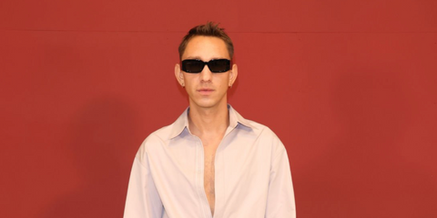 Musician Oliver Sim of the acclaimed band The xx was seen wearing black Gucci GG1426S 001 sunglasses at the Gucci Spring/Summer 2024 fashion show during Milan Fashion Week