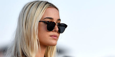 Gymnast and influencer Olivia Dunne was seen wearing tortoiseshell Ray-Ban Clubmaster Classic 3016 W0366 sunglasses at an NASCAR event. Shop online now on Pretavoir