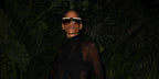 Dominican model Omahyra Mota was seen wearing gold and ivory white Saint Laurent Sun SL 537 Palace 002 shield sunglasses with brown gradient lenses at the Saint Laurent Art Basel Miami Beach Party, December 2022