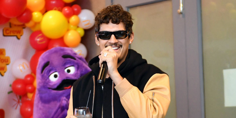 Omar Apollo was seen wearing black Tom Ford Andres-02 TF986 01N rectangular sunglasses with green lenses at a Thank You Crew party celebrating McDonalds employees in Times Square