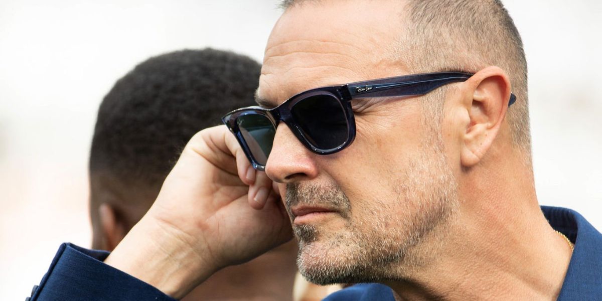 Comedian and actor Paddy McGuinness was seen wearing transparent navy Ray-Ban Wayfarer Reverse RB R0502S 6708/3A sunglasses with blue lenses at the Soccer Aid 2026 in London.
