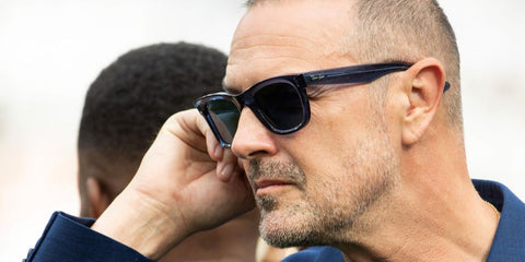 Comedian and actor Paddy McGuinness was seen wearing transparent navy Ray-Ban Wayfarer Reverse RB R0502S 6708/3A sunglasses with blue lenses at the Soccer Aid 2026 in London.