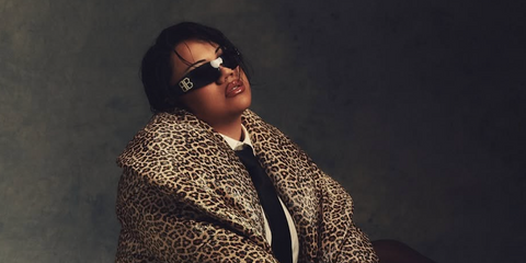 New Zealand dancer and choreographer Parris Goebel was seen wearing Balenciaga BB0359S 005 wraparound sunglasses with crystal-studded logo in a Blanc magazine feature, February 2026.