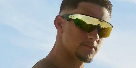 Patrick Mahomes was seen wearing black Oakley Meta Vanguard OW8001 04 with 24k Prizm lenses Smart Glasses in the Oakley Meta campaign.