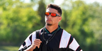 Patrick Mahomes wore black and red Oakley Permian OO9520 11 sunglasses with Prizm ruby lenses in September 2026.