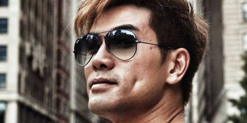 Hong Kong actor Philip Ng was seen wearing gunmetal Ray-Ban Aviator Large Metal RB 3025 004/71 sunglasses with grey gradient lenses n a social media post.