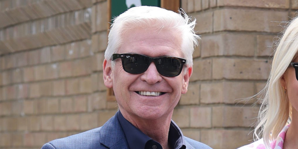 British presenter Phillip Schofield was seen wearing Ray-Ban New Wayfarer RB 2132 901L sunglasses at All England Lawn Tennis and Croquet Club in London, June 2022