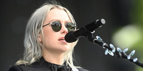 Singer-songwriter Phoebe Bridgers was seen wearing black Garrett Leight Wilson 4003 BK-PW/SFPG15 round sunglasses with green lenses in London. Shop online now on Pretavoir