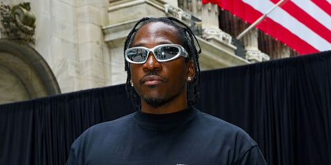 Rapper Pusha T was seen wearing grey Balenciaga BB0157S 004 sunglasses at the Balenciaga Spring/Summer 2023 presentation in New York City. Shop online now on Pretavoir