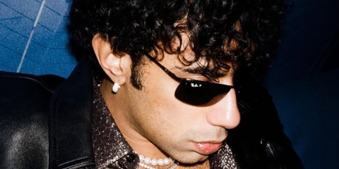 Italian rapper Pyrex was seen wearing black Ray-Ban 3183 002/81 Polarised sunglasses in his Instagram post, January 2023.