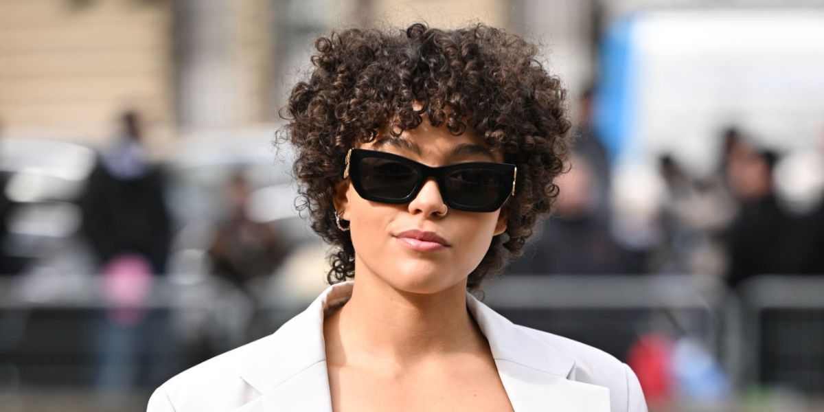 Quintessa Swindell was seen wearing black Miu Miu MU 09WS 1AB5S0 sunglasses at the Miu Miu Fall/Winter 2023 fashion show during Paris Fashion Week. Shop online now on Pretavoir