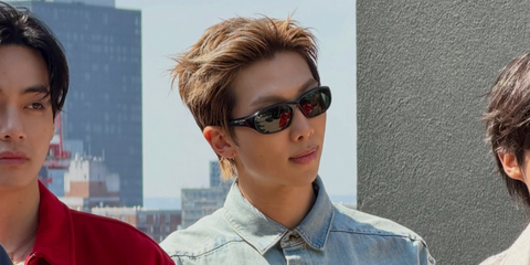 South Korean celebrity singer rapper RM of BTS was seen wearing black Ray-Ban Daddy-O RB 2016 601/31 sunglasses in New York City, following the BTS Comeback Live Concert in March 2026.