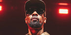 Celebrity rapper RZA was seen wearing black Versace Medusa Charm 2199 1002/81 Polarised sunglasses at the Wu-Tang Clan performance in Sydney, March 2026.