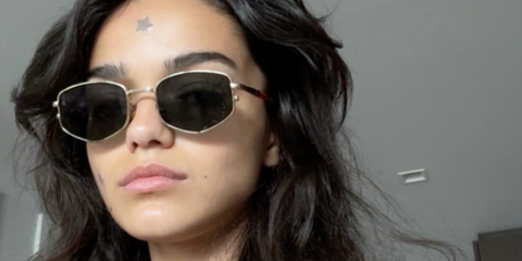 Rachel Zegler was seen wearing gold David Beckham DB 1129/S RHL sunglasses in a social media post