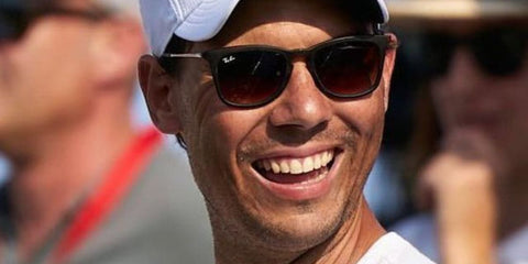 Spanish tennis legend Rafael Nadal was seen wearing Ray-Ban Chris RB 4187 856/13 sunglasses. Shop online now on Pretavoir
