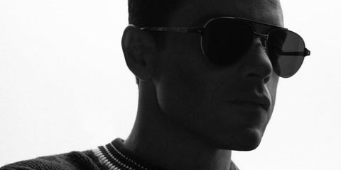 Rami Malek was seen wearing ruthenium Cartier CT0476S 005 Polarised aviator sunglasses in a Numero Netherlands feature, October 2025.