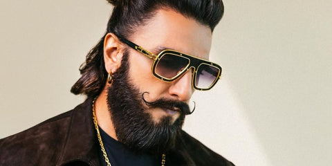 Indian actor Ranveer Singh was seen wearing black and gold Dita Raketo DTS427-A-02 Limited Edition sunglasses in his Instagram post