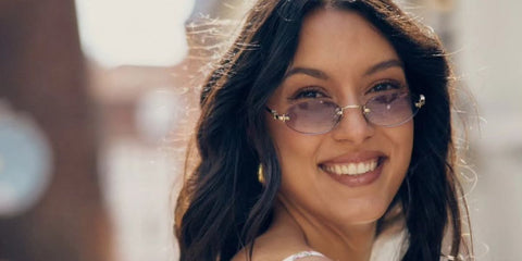 German model and television host Rebecca Mir was seen wearing gold Miu Miu MU A54S 5AK04O rimless oval sunglasses with grey gradient lenses during Copenhagen Fashion Week, August 2025.