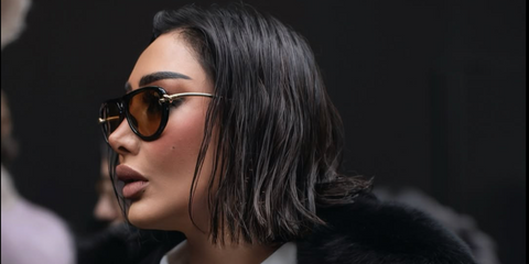 Saudi fashion influencer Reem Al Swaidi was seen wearing black Bottega Veneta BV1418S 001 sunglasses with yellow lenses at the Dolce & Gabbana Menswear Fall/Winter 2026 fashion show during Milan Men's Fashion Week.