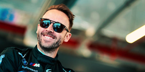 German professional racing driver Rene Rast was seen wearing black Oakley Latch Beta OO9436 01 Prizm sunglasses in his website homepage