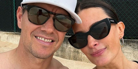 Model Rhea Durham, pictured with husband Mark Wahlberg, was seen wearing black Prada PR A09S 1AB5S0 sunglasses. Shop online now on Pretavoir